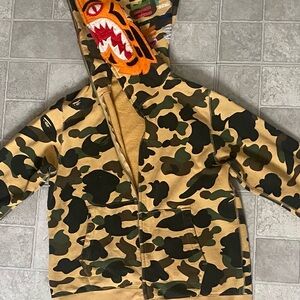Bape Camouflage Hoodie with Orange and Black Accents